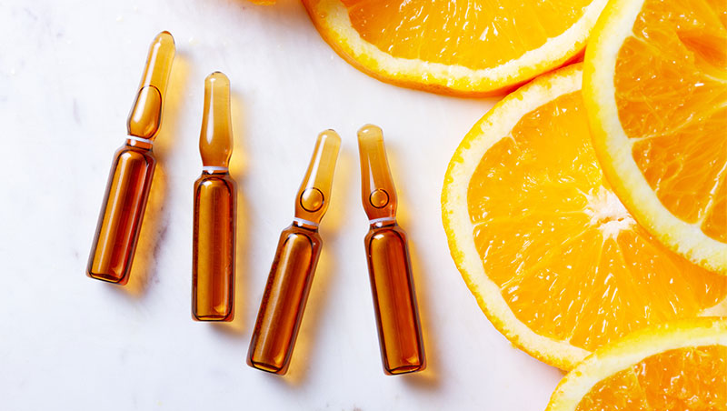 ampollas vitamina c naranjas rodajas