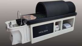 Holispa revoluciona os institutos de estética ao combinar calor, cama de infravermelhos e head spa num único equipamento versátil