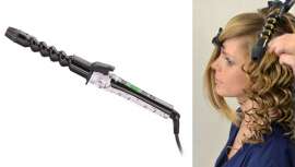 Este rizador cónico tiene un recubrimiento de turmalina cerámica que reduce la electricidad estática, dejando el pelo sedoso y brillante